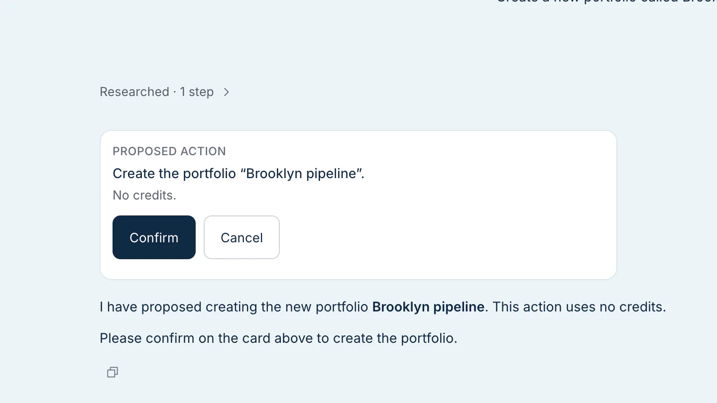 Proposed action card in Research to create a portfolio, with Confirm and Cancel